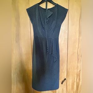 Gorgeous form fitting with perfectly placed ruffles.